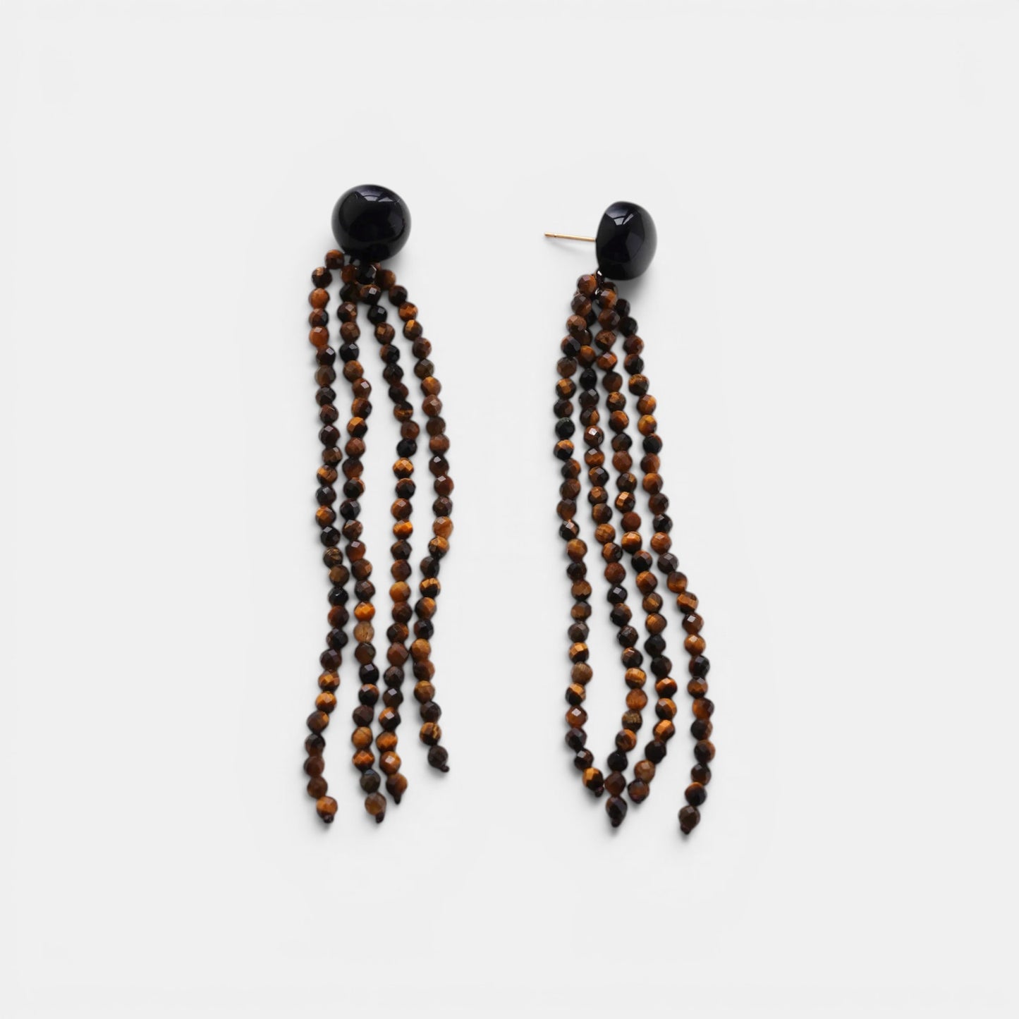 Hollywood Road Stories beaded tassel earrings featuring faceted tiger's eye strands and polished black onyx studs.
