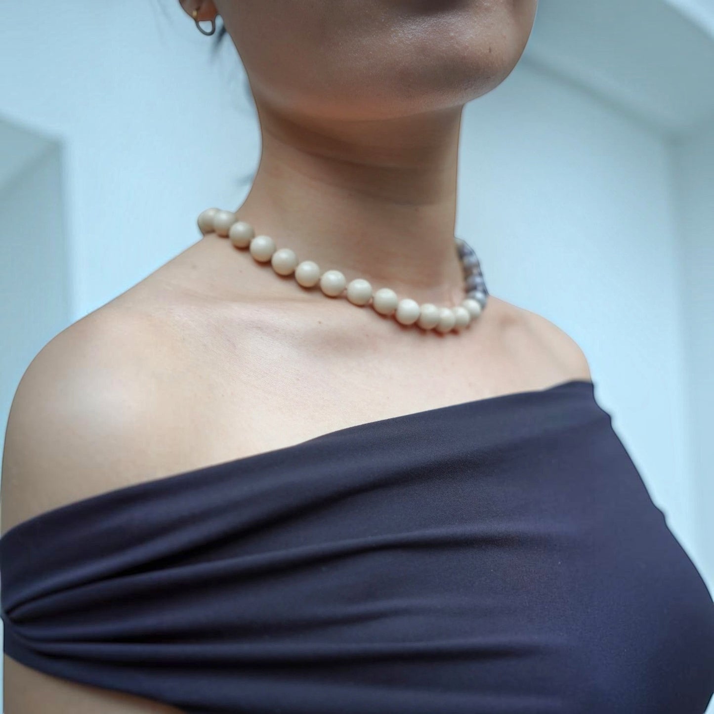 Hollywood Road Stories Bonham beaded choker with cream fossil jasper and smoky agate beads on a model