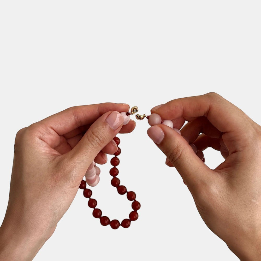 Hollywood Road Stories Hong Kong handmade necklace with pink opal and carnelian beads, sleek magnetic clasp, artisan gemstone jewelry.