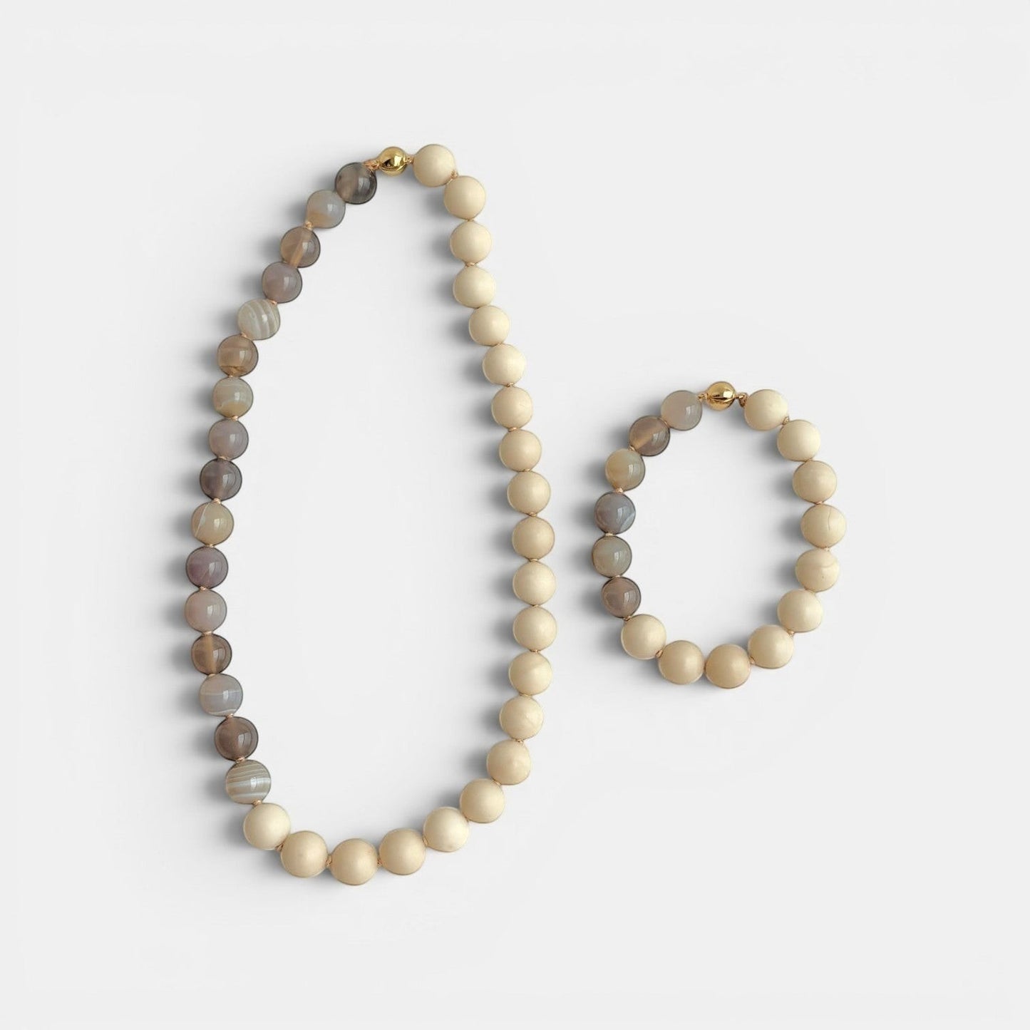 Hollywood Road Stories Hong Kong handmade necklace with natural agate and fossil jasper beads, sleek magnetic clasp, artisan gemstone jewelry.