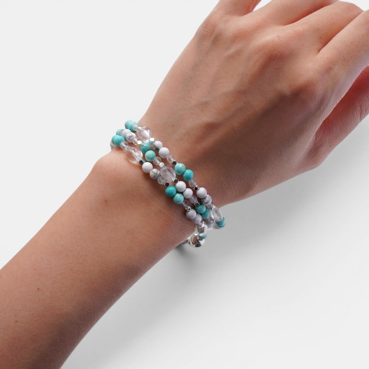 Hollywood Road Stories multi-strand beaded bracelet with turquoise, white, and clear crystal beads on a wrist