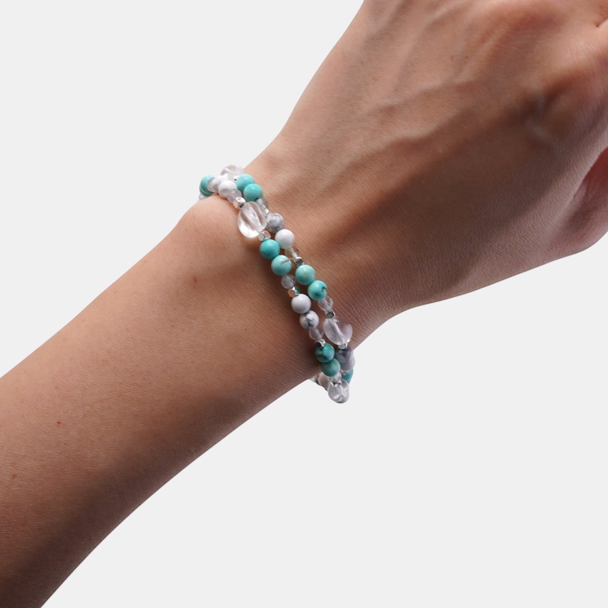 Hollywood Road Stories multi-strand beaded wrap bracelet with turquoise, white howlite, and clear crystal beads on wrist