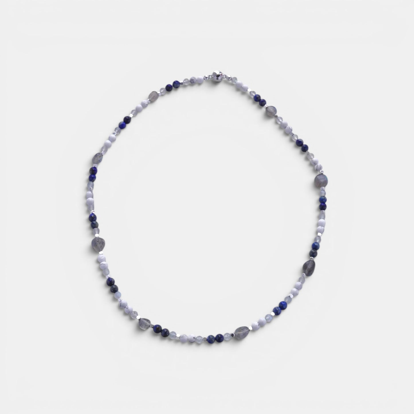 Hollywood Road Stories beaded gemstone necklace with blue lapis, white howlite, and grey labradorite with magnetic clasp