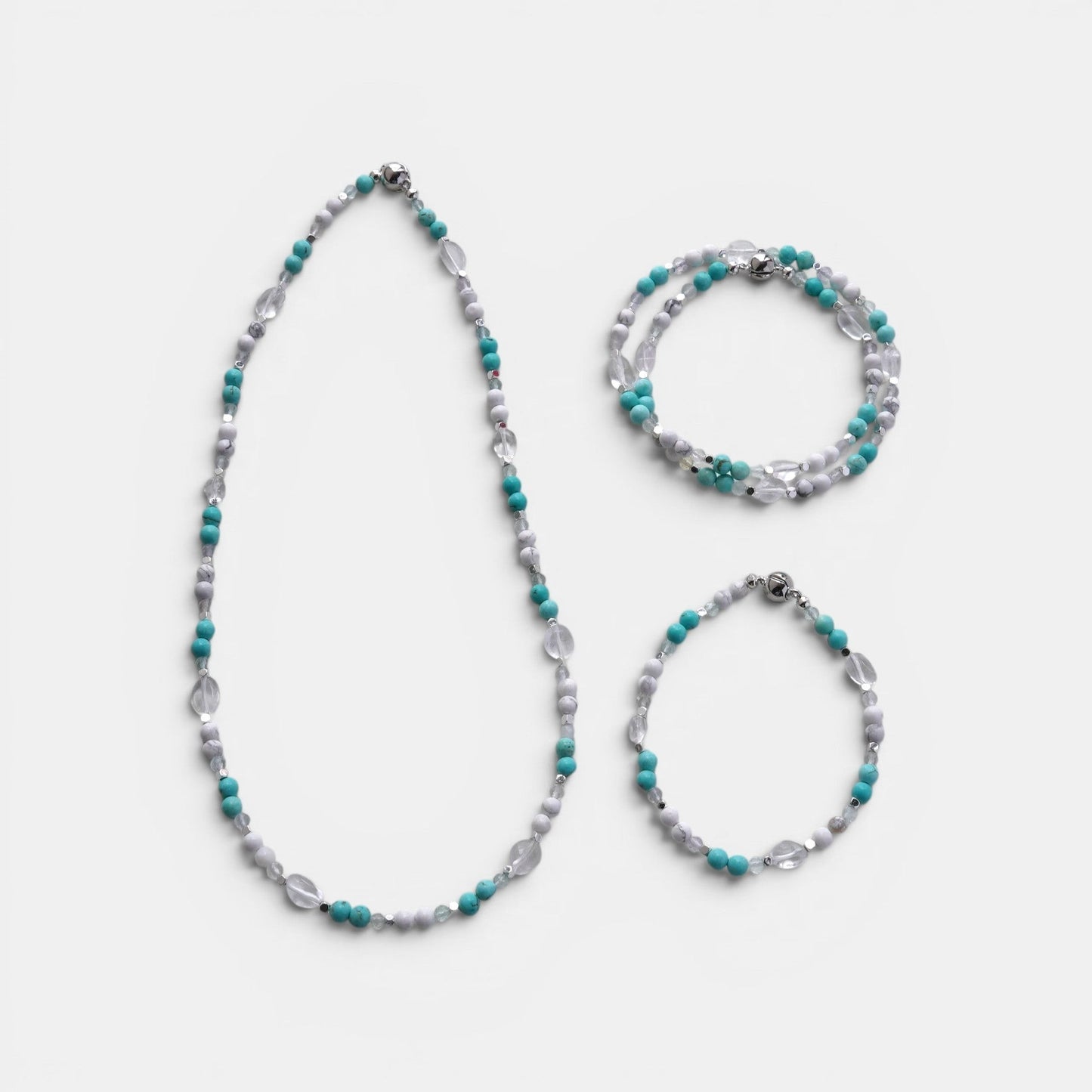 Hollywood Road Stories beaded jewelry set featuring turquoise, white howlite, and clear crystal beads with magnetic clasps