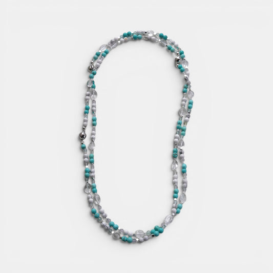 Hollywood Road Stories multi-strand beaded necklace with turquoise, white, and clear crystal beads and silver accents.