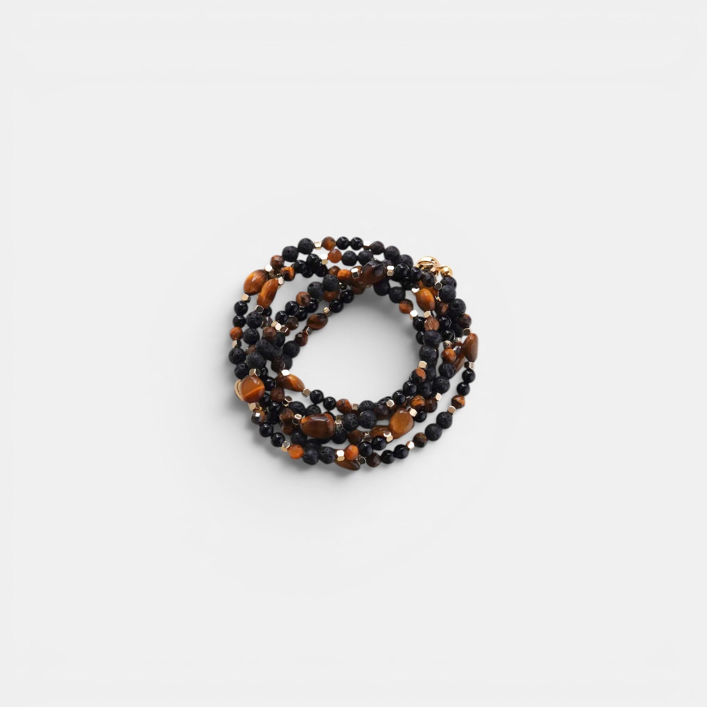 Hollywood Road Stories beaded layering necklace with black onyx, tiger eye stones, and metallic accents.