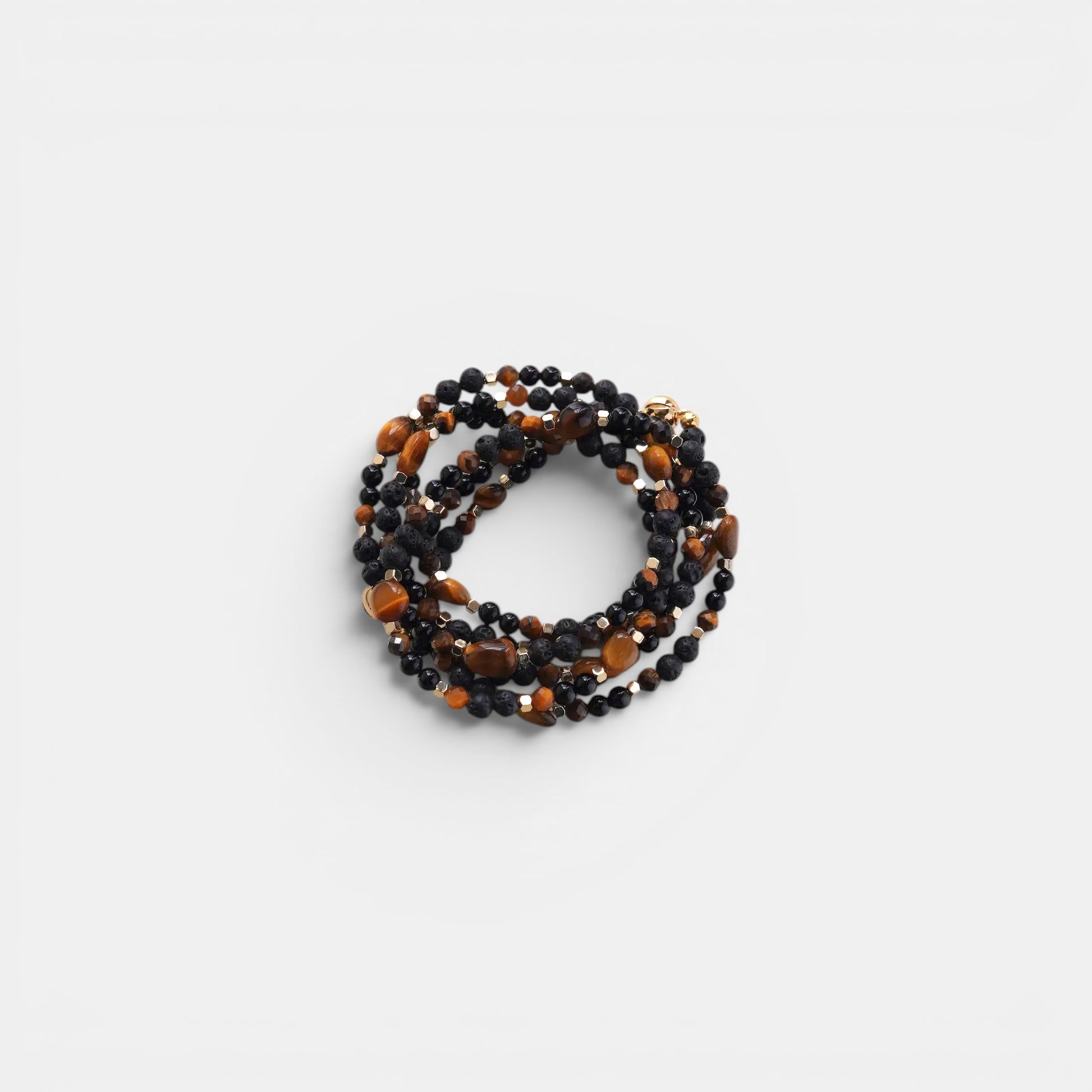 Hollywood Road Stories beaded layering necklace with black onyx, tiger eye stones, and metallic accents.