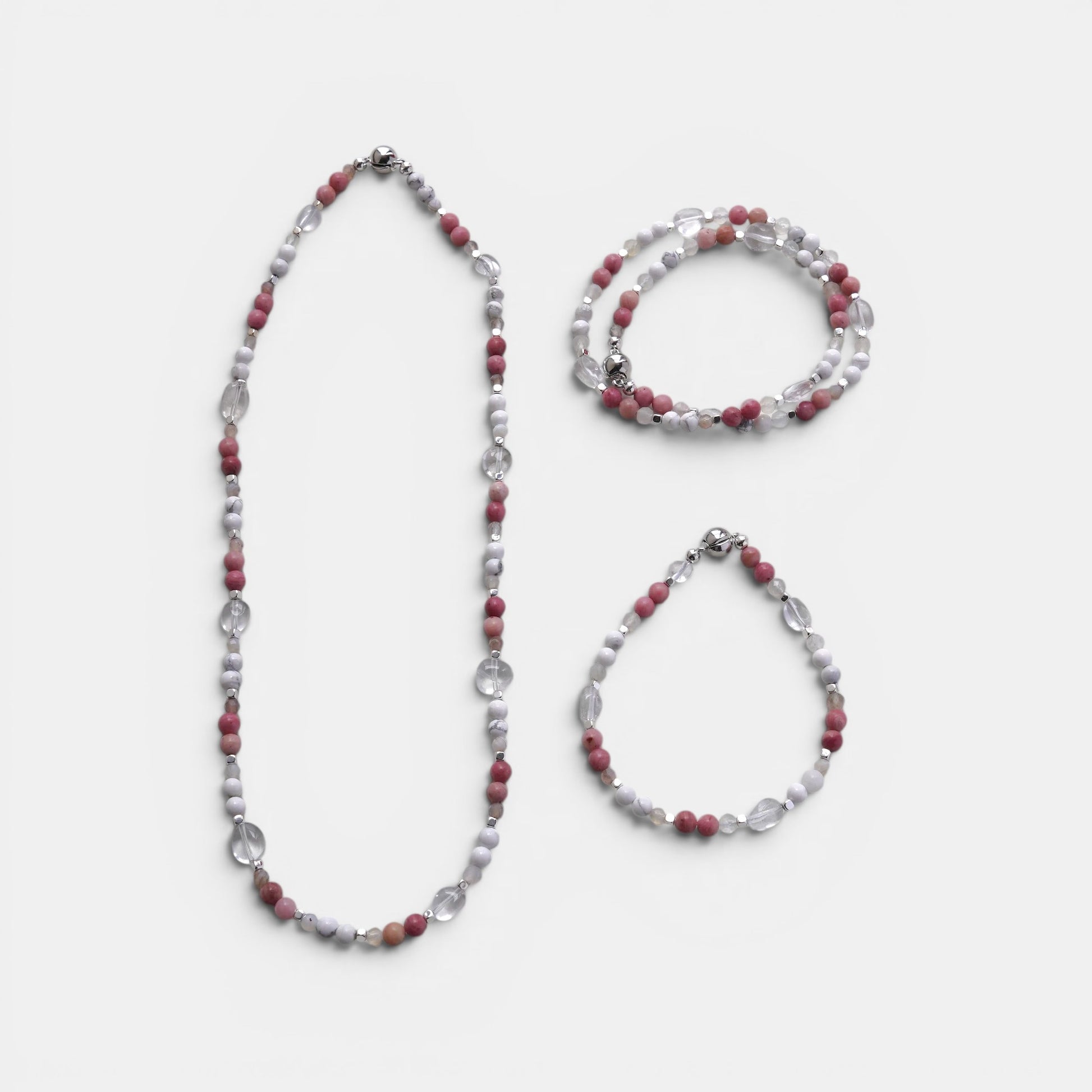 Hollywood Road Stories beaded necklace and bracelet set featuring pink rhodonite, white howlite, and clear crystal beads.
