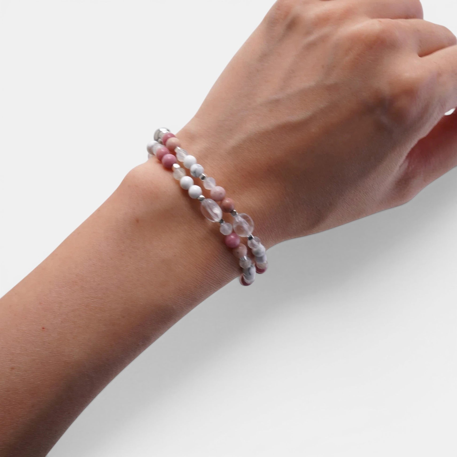 Hollywood Road Stories double-strand stretch bracelet with pink, white, and crystal beads on a wrist
