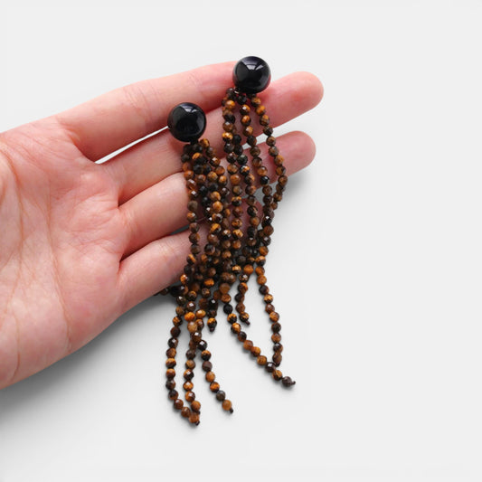 Hollywood Road Stories beaded tassel earrings with faceted tiger's eye strands and polished black onyx studs.