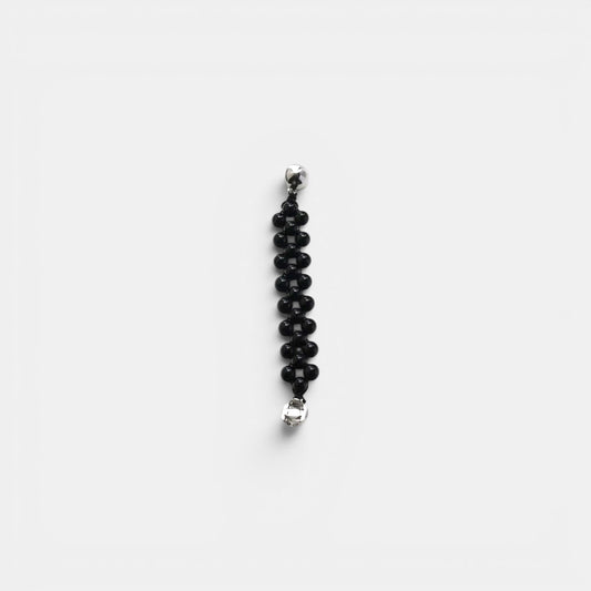 Hollywood Road Stories black beaded bracelet with multi-row woven design and polished silver-tone hardware.