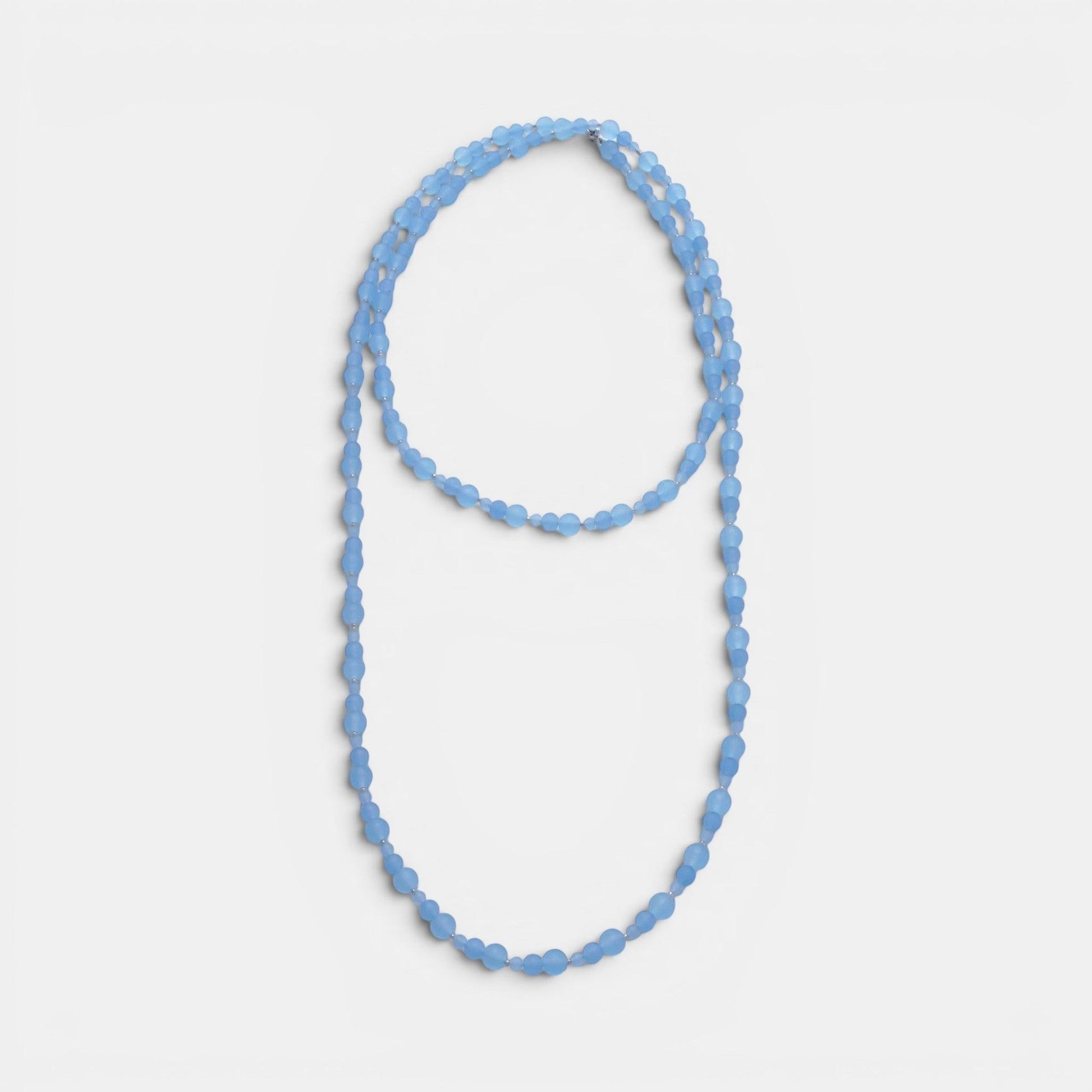 Hollywood Road Stories triple-strand frosted sky blue glass bead necklace with silver-toned spacers.