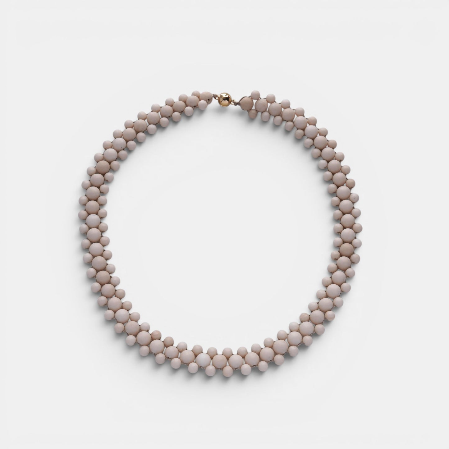Hollywood Road Stories double strand cream beaded statement necklace with a polished gold-tone clasp.