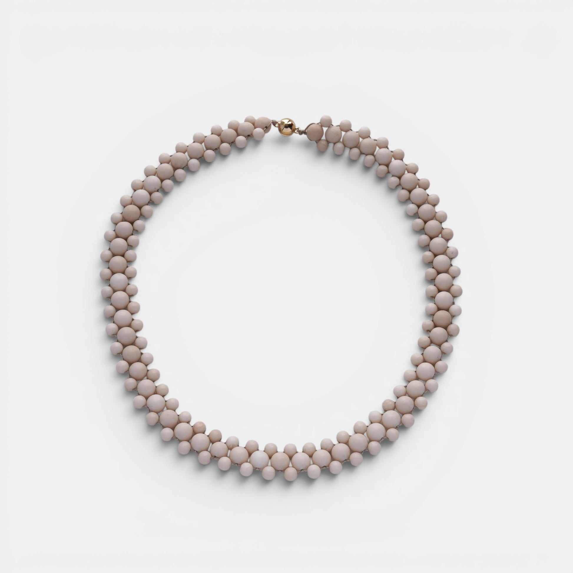Hollywood Road Stories double strand cream beaded statement necklace with a polished gold-tone clasp.