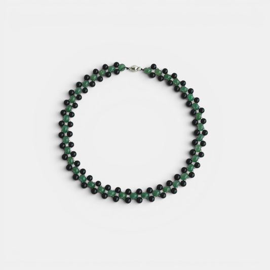 Hollywood Road Stories double strand choker necklace featuring green jade and black lava stone beads on a light background