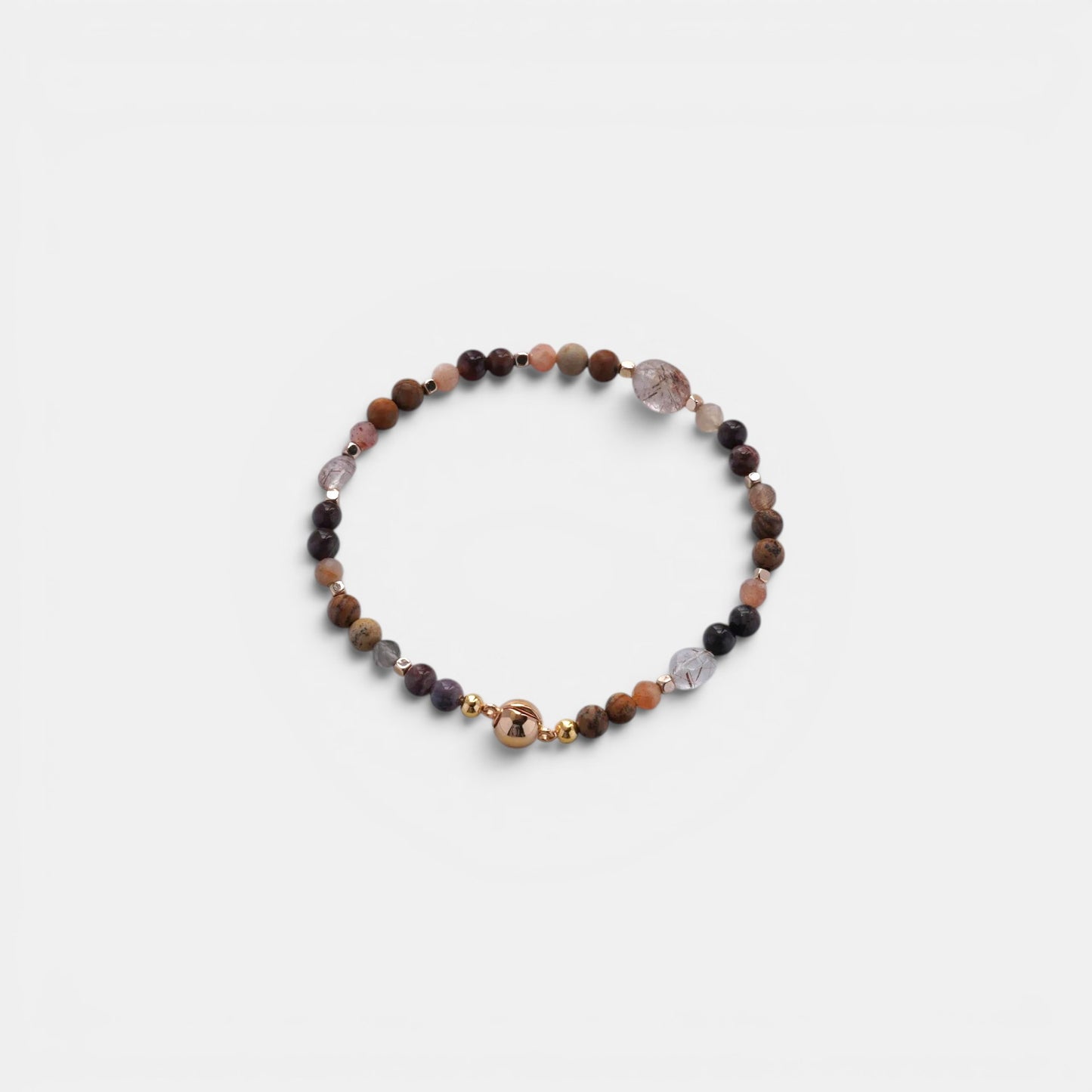 Hollywood Road Stories stretch bracelet with natural gemstone beads in brown, pink, and quartz with gold-tone accents.