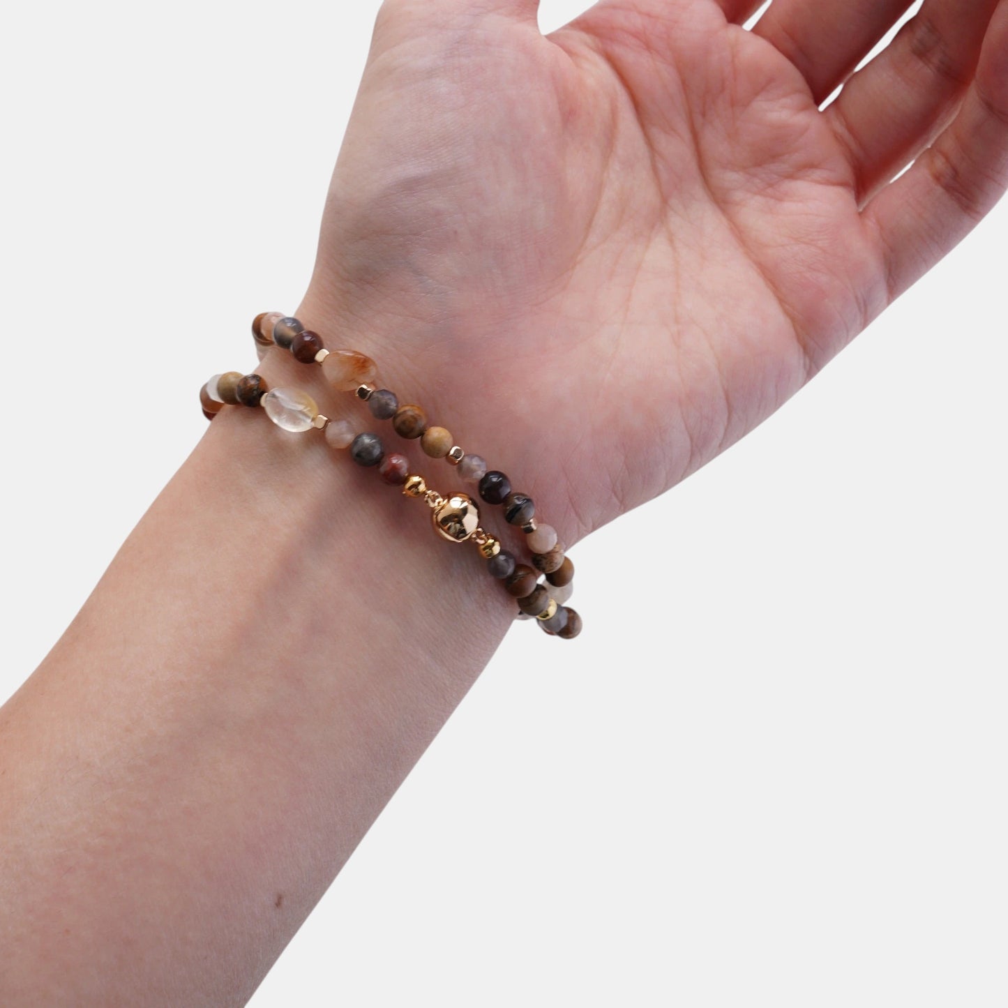 Hollywood Road Stories multi-stone beaded wrap bracelet with earth-toned gemstones and gold-tone spacers on a wrist