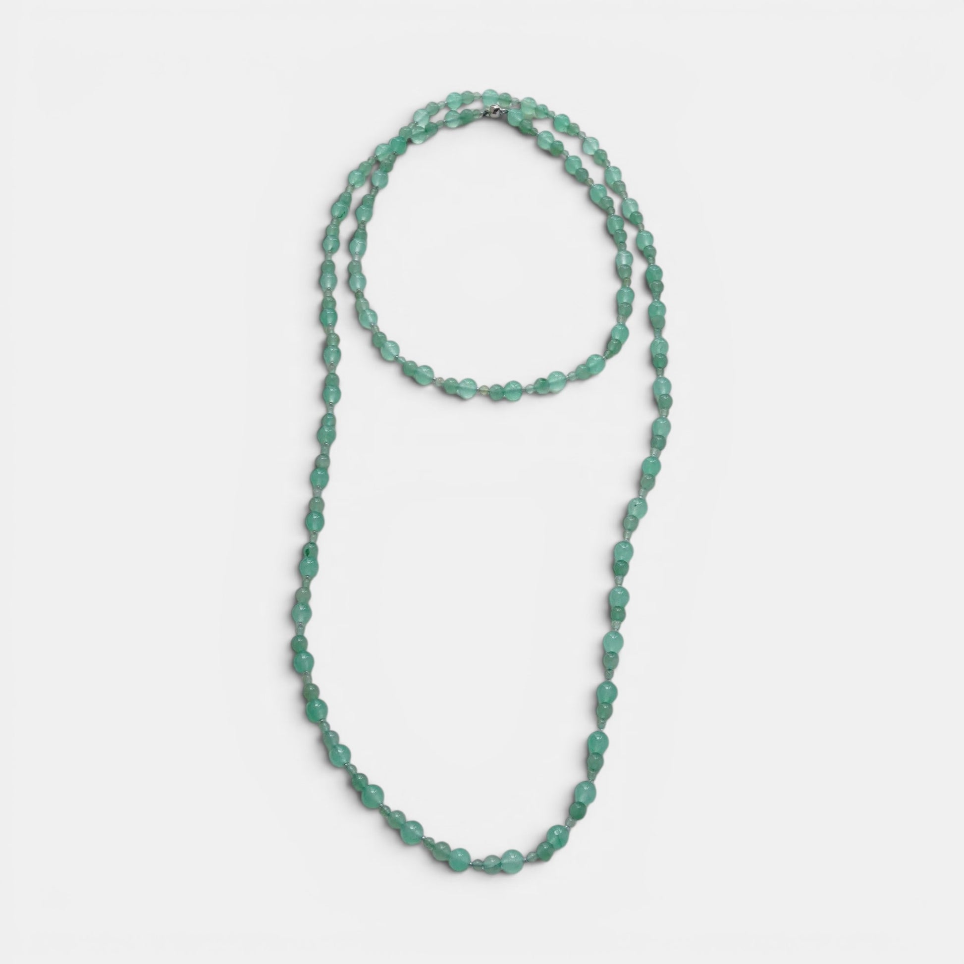 Hollywood Road Stories multi-strand necklace featuring smooth, round seafoam green aventurine gemstone beads.