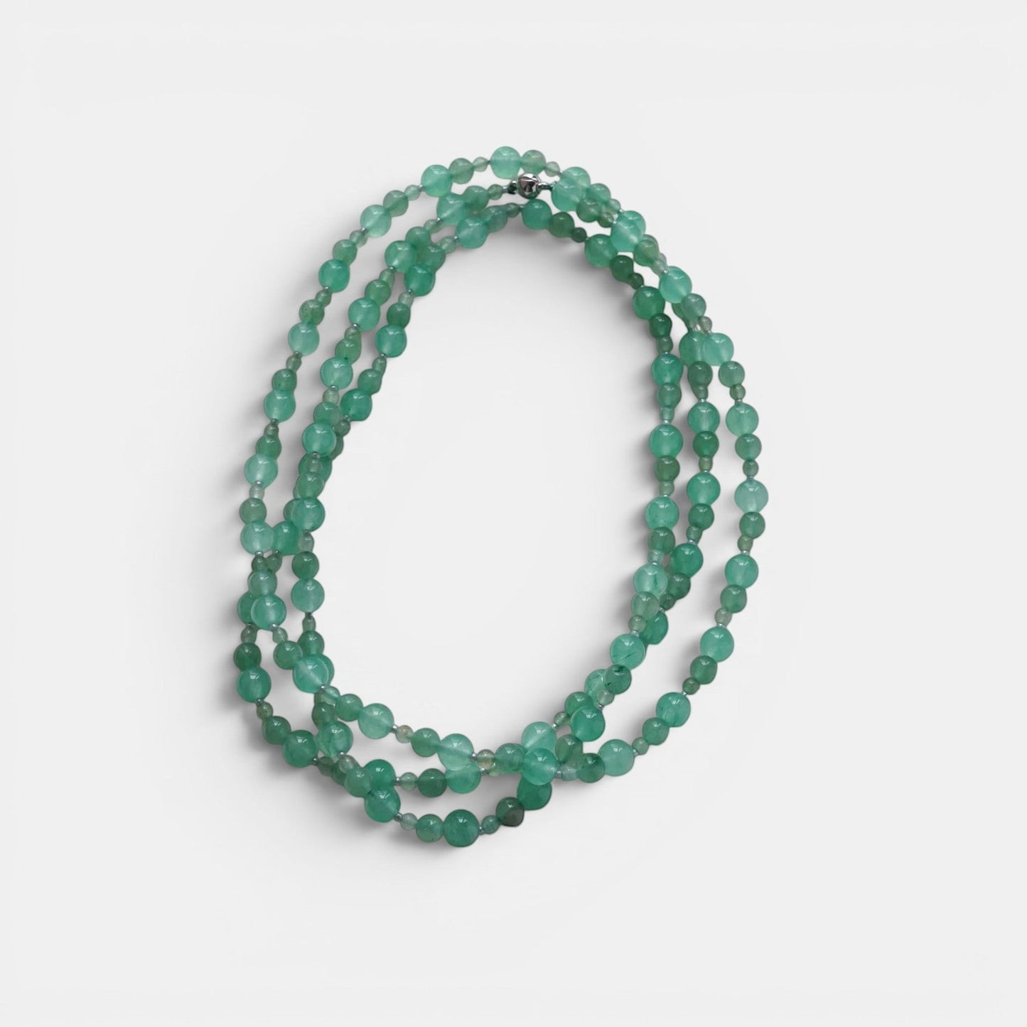 Hollywood Road Stories multi-strand necklace featuring smooth, round seafoam green aventurine gemstone beads.
