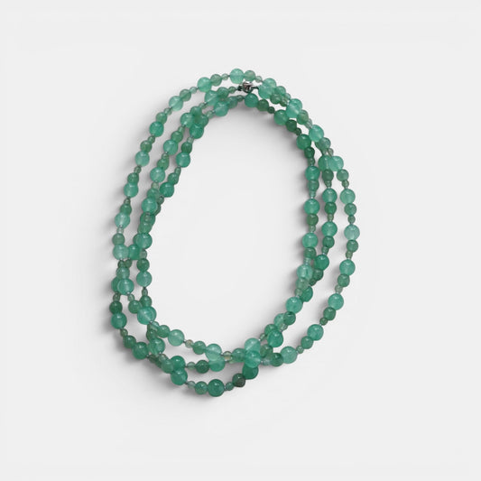 Hollywood Road Stories multi-strand necklace featuring smooth, round seafoam green aventurine gemstone beads.