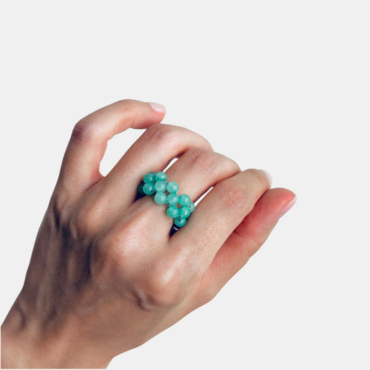 Hollywood Road Stories green beaded statement ring worn on a finger, featuring a multi-strand design.