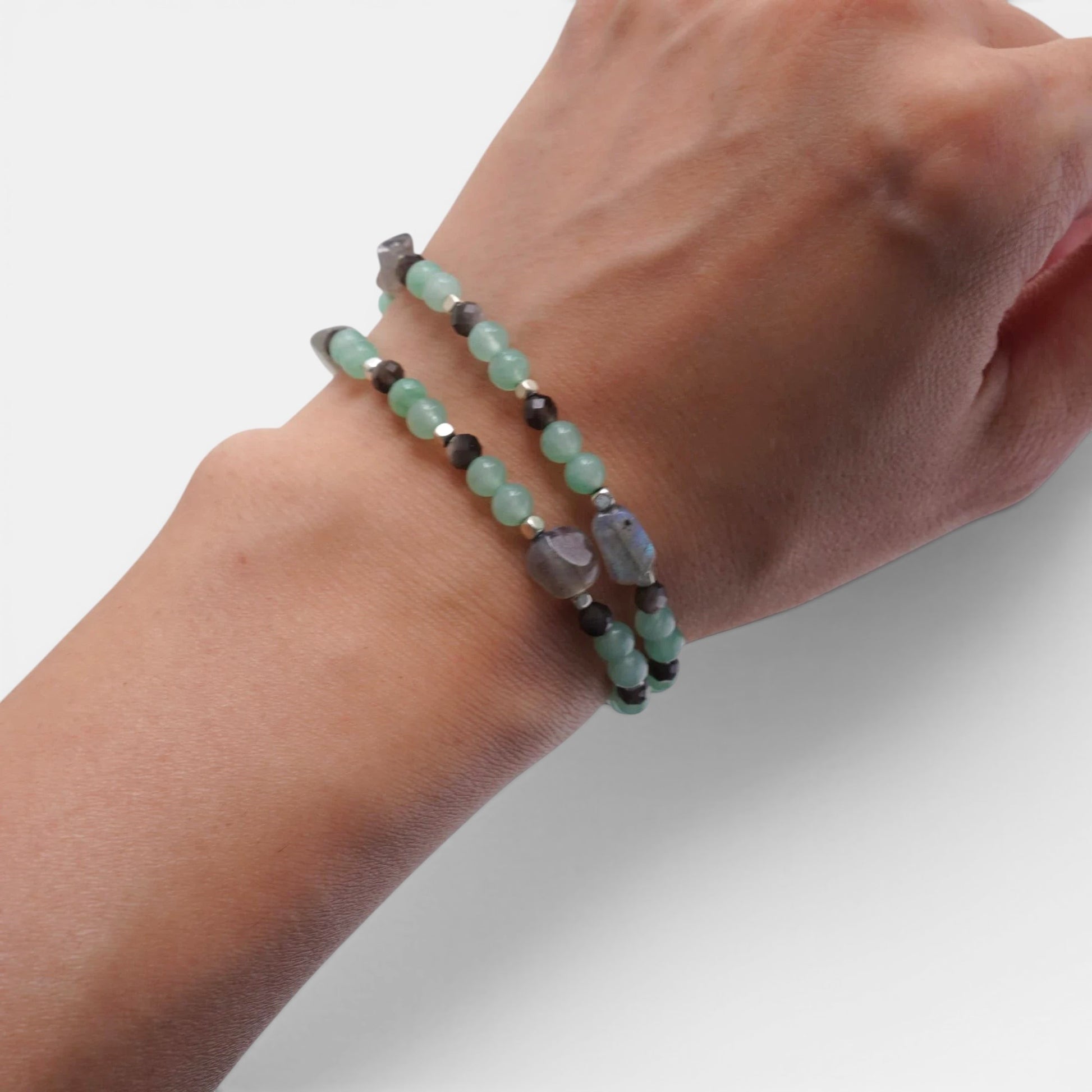 Hollywood Road Stories double-strand stretch bracelet featuring mint-green jade and grey gemstone beads with metallic accents