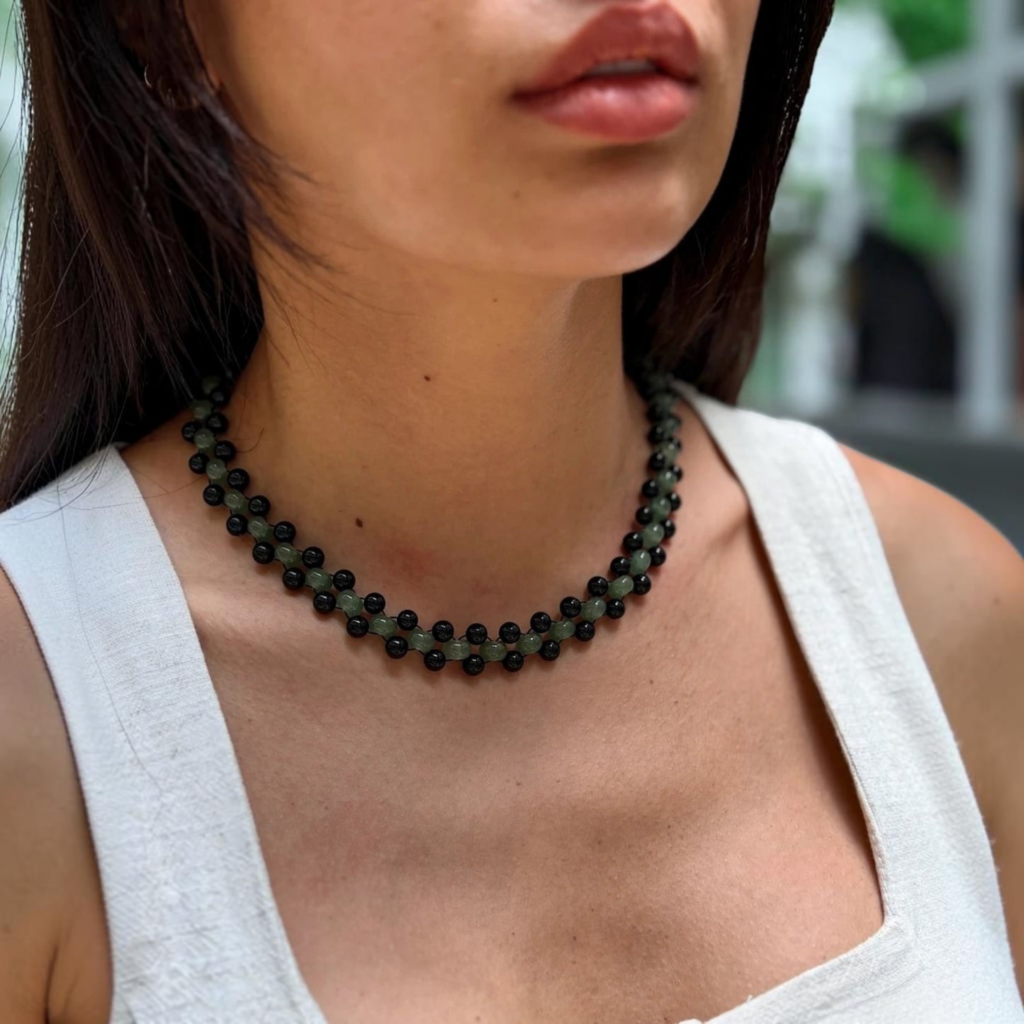 Hollywood Road Stories double strand choker featuring green jade and black lava stone beads worn on a model