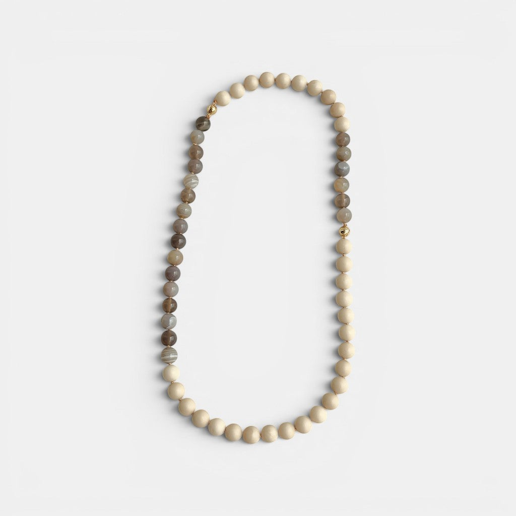 Hollywood Road Stories beaded necklace with cream fossil jasper and smoky agate stones and a 14K gold-plated clasp.