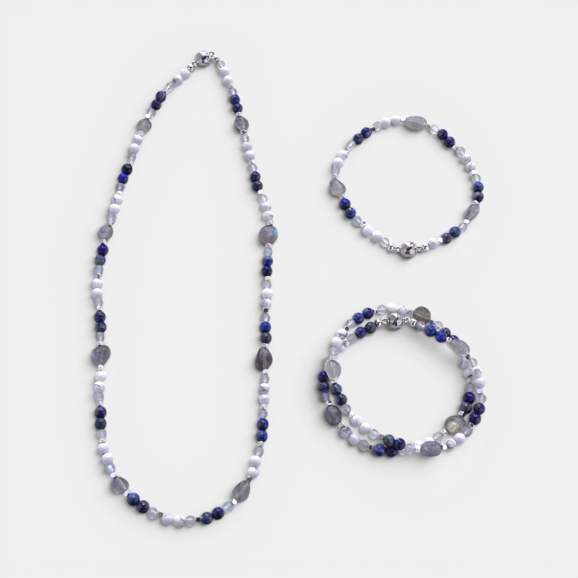 Hollywood Road Stories multi-stone beaded necklace and matching bracelets with howlite, lapis lazuli, and labradorite.