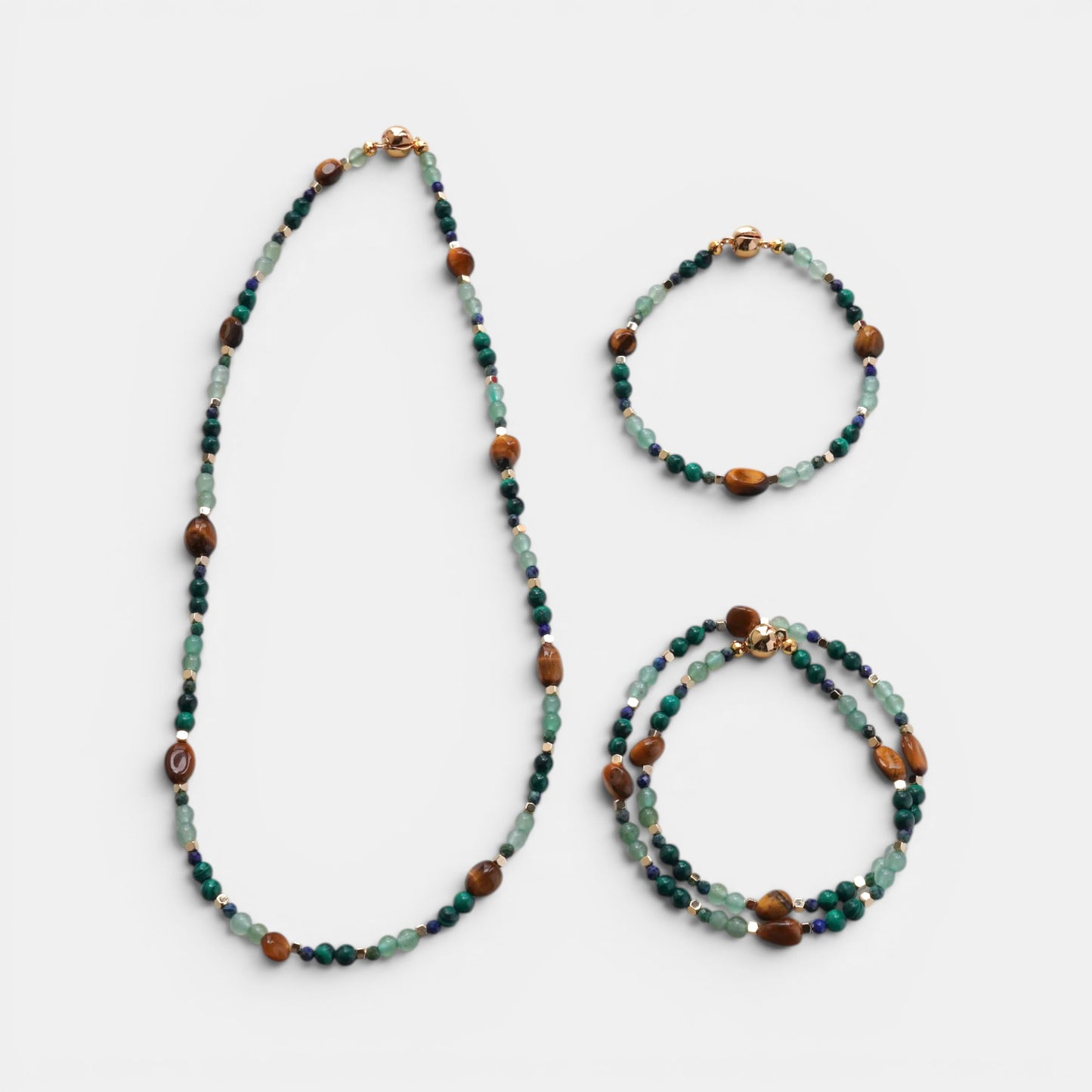 Hollywood Road Stories multi-stone beaded necklace and bracelet set with tiger's eye, malachite, and fluorite beads.