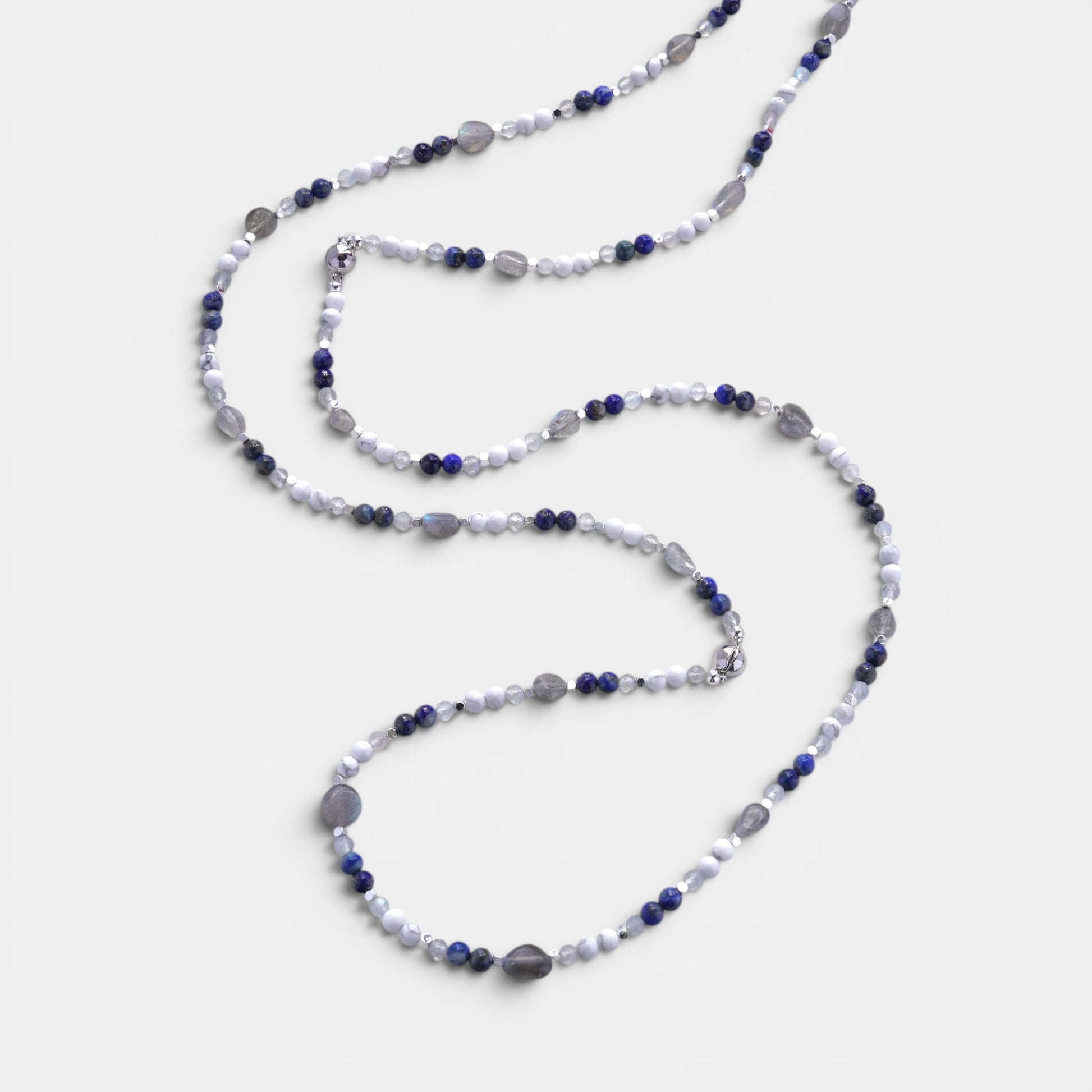 Hollywood Road Stories long beaded necklace featuring white howlite, blue lapis lazuli, and labradorite gemstones.