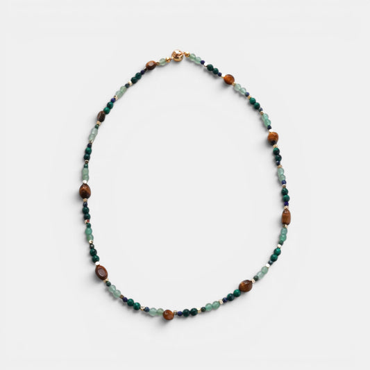 Hollywood Road Stories multi-stone beaded necklace featuring tiger's eye, malachite, and aventurine with gold clasp.