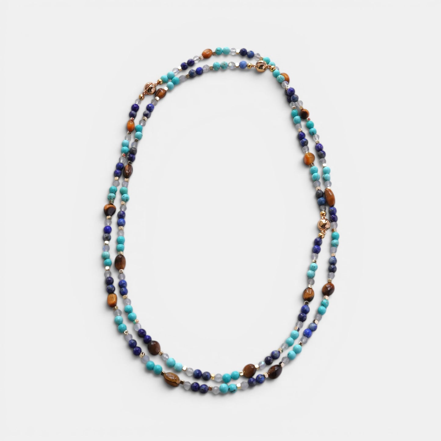 Hollywood Road Stories long beaded necklace with turquoise, lapis lazuli, tiger's eye, and gold-tone accents.