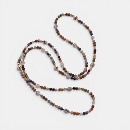 Hollywood Road Stories multi-strand beaded necklace with terracotta, grey, and cream natural stones and gold accents.