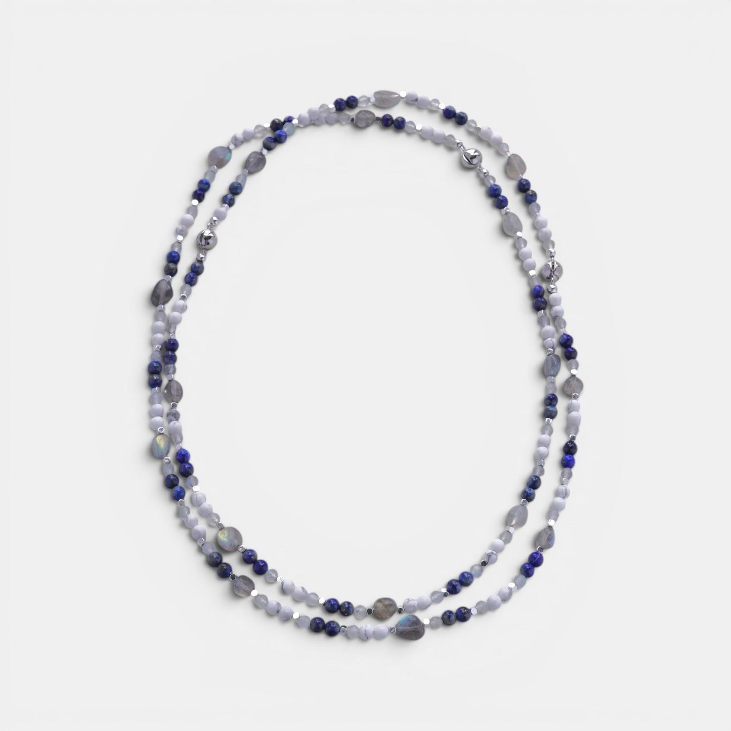 Hollywood Road Stories long necklace with white howlite, blue lapis lazuli, and labradorite beads with silver spacers.