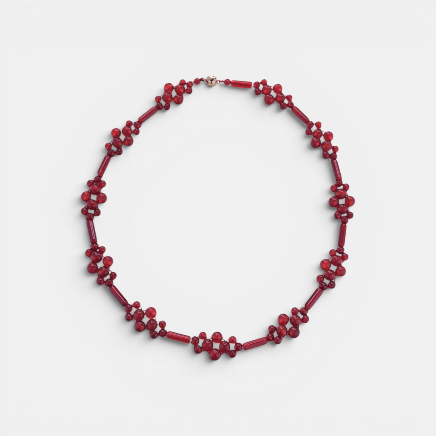 Hollywood Road Stories handcrafted red beaded statement necklace with floral-inspired clusters and gold-tone clasp.