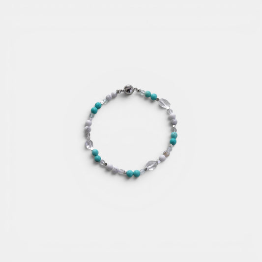 Hollywood Road Stories beaded bracelet with turquoise, marbled white stone, and clear crystal beads with silver clasp.