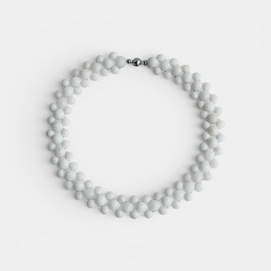 Hollywood Road Stories multi-strand white beaded statement necklace with a polished silver-tone clasp.