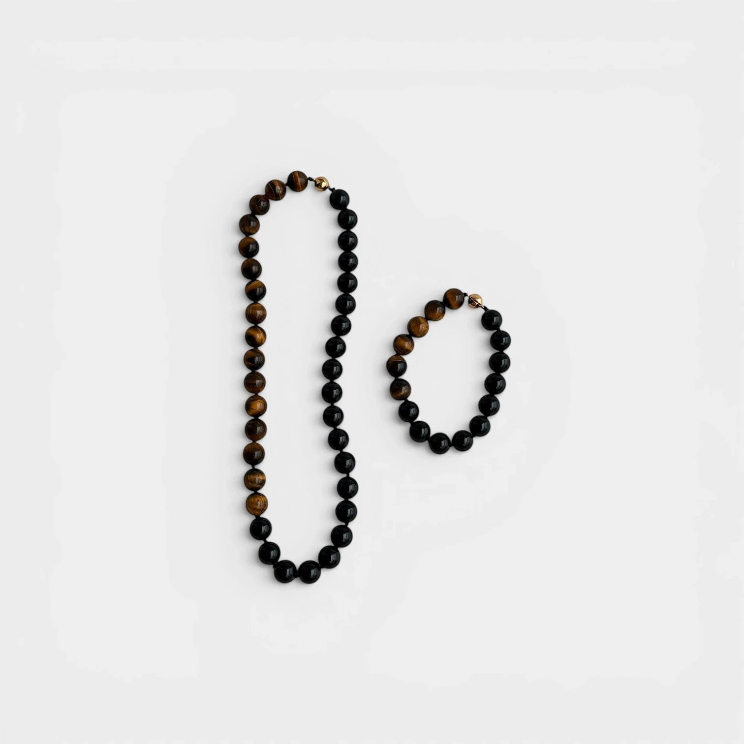 necklace and bracelet set featuring polished black onyx and tiger's eye stone beads. Gift for her from Hong Kong.